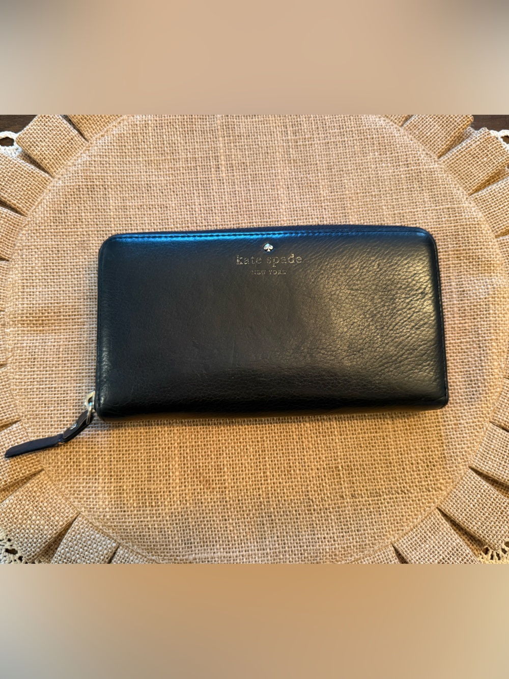 kate spade black leather zip-around wallet with gold logo